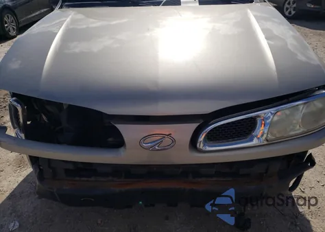 2002 Oldsmobile Bravada из США, поврежденный, VIN 1GHDT13S222235495